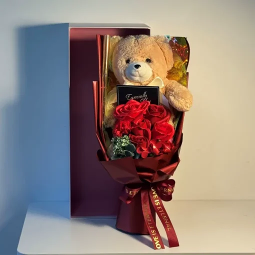red soap flower and teddy bear bouquet with gift box